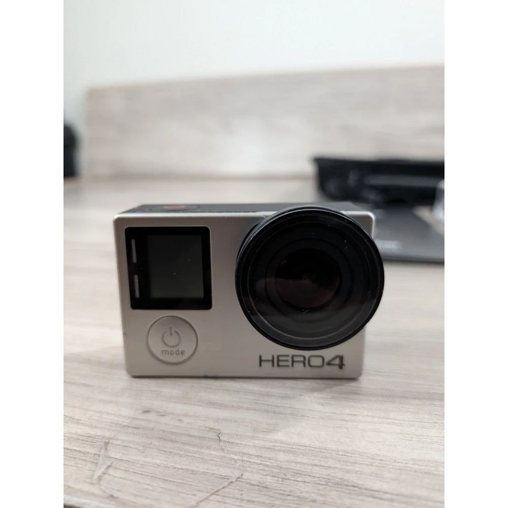 GoPro Hero 4 Silver Edition- with Accessories and Case Included